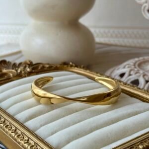 Sculptural gold open cuff bangle