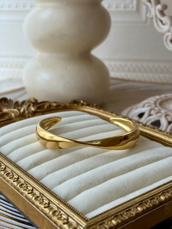 Sculptural gold open cuff bangle
