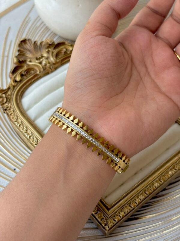 Gold spiked baguette bangle